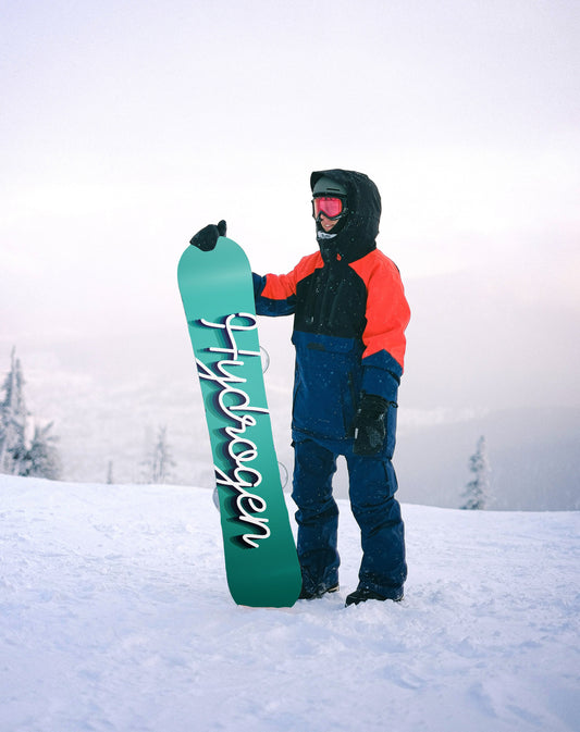 Person standing next to Hydrogen snowboard